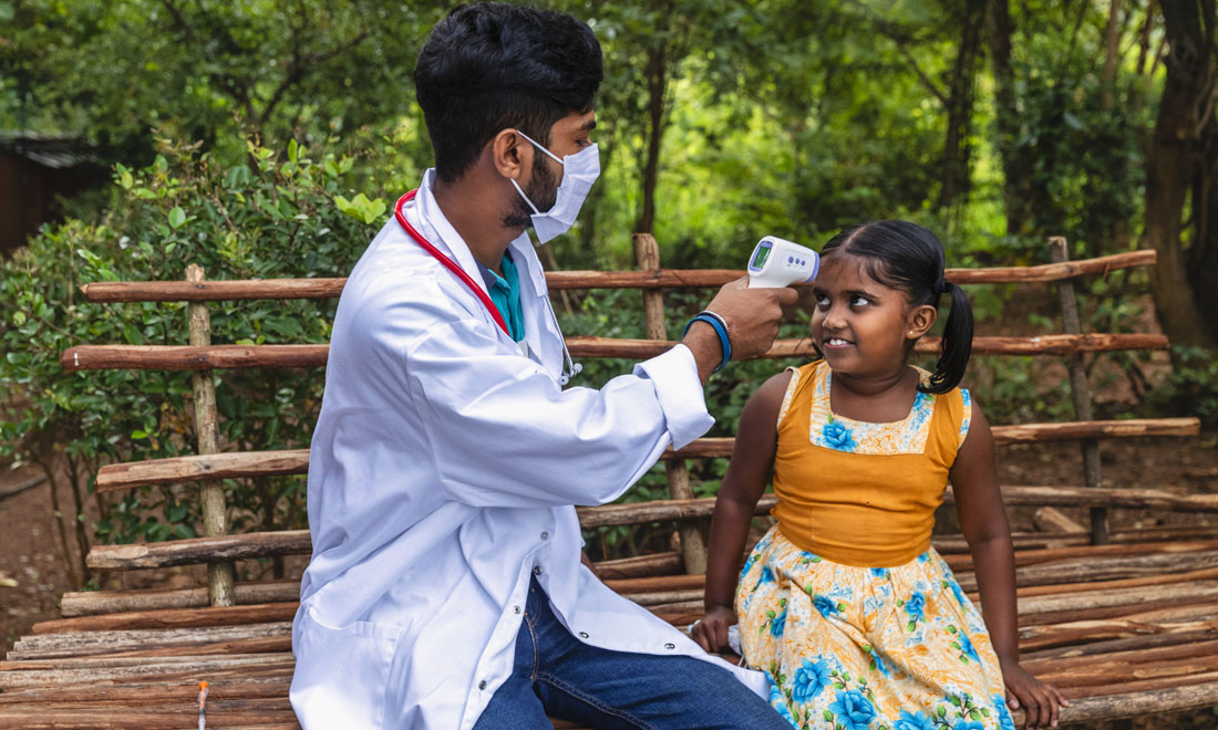 photo of mother holding baby